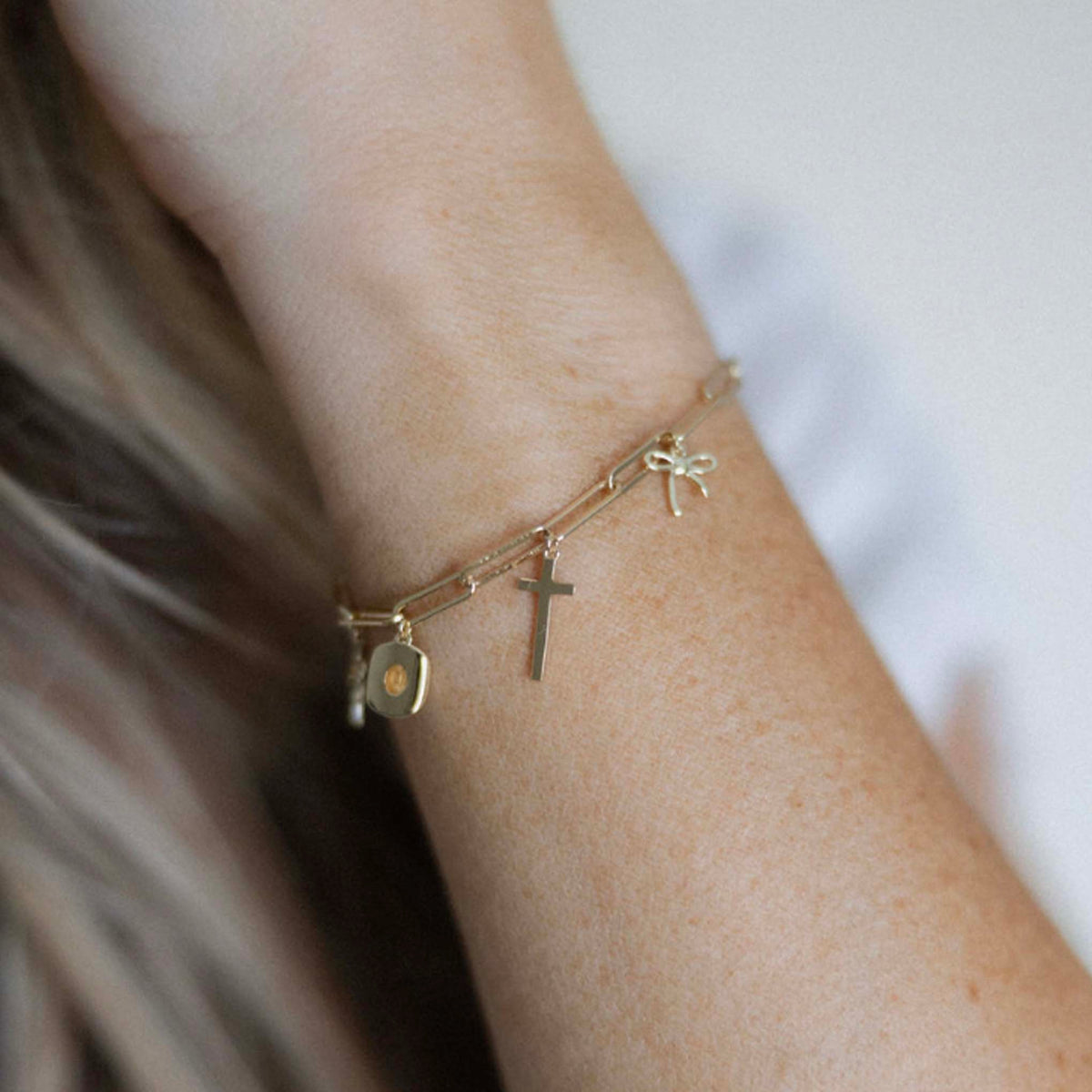The Laura Cross Charm Bracelet
