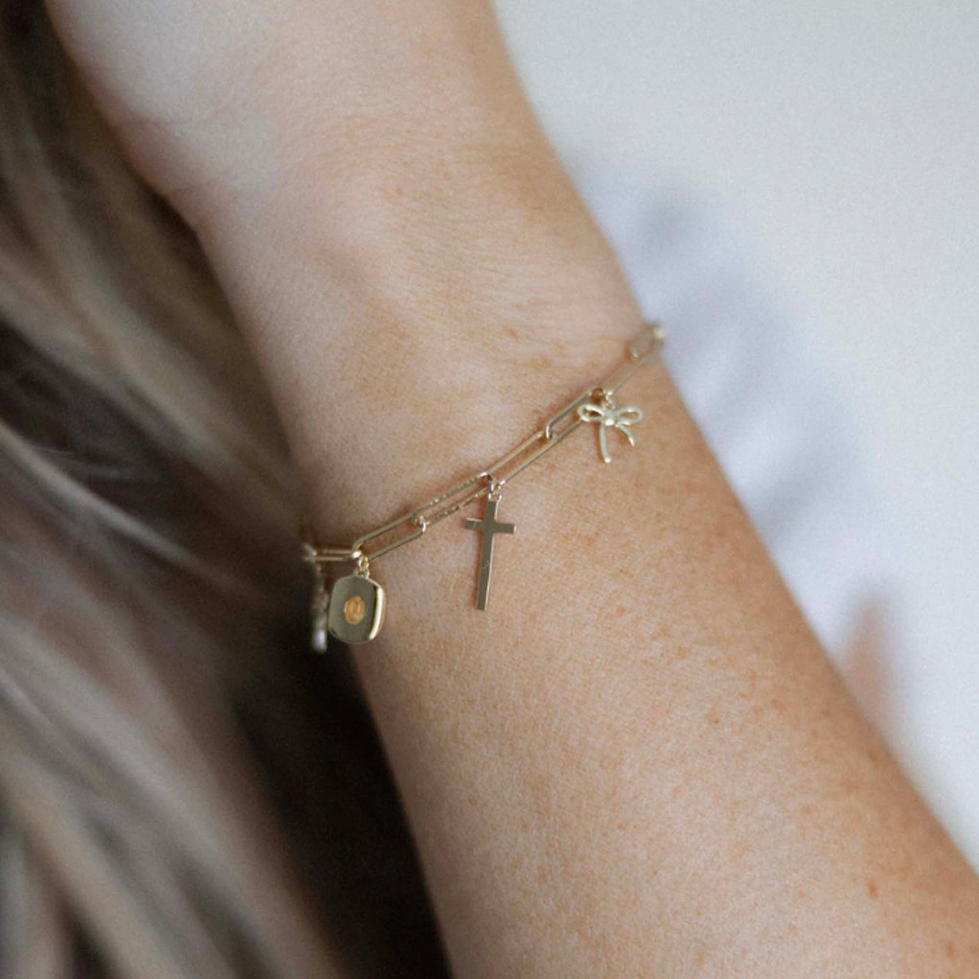 The Laura Cross Charm Bracelet