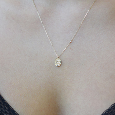 14kt Gold "Love Conquers All" Diamond Pendant