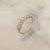 Solid Gold White Topaz & Diamond Angel’s Bridge Ring