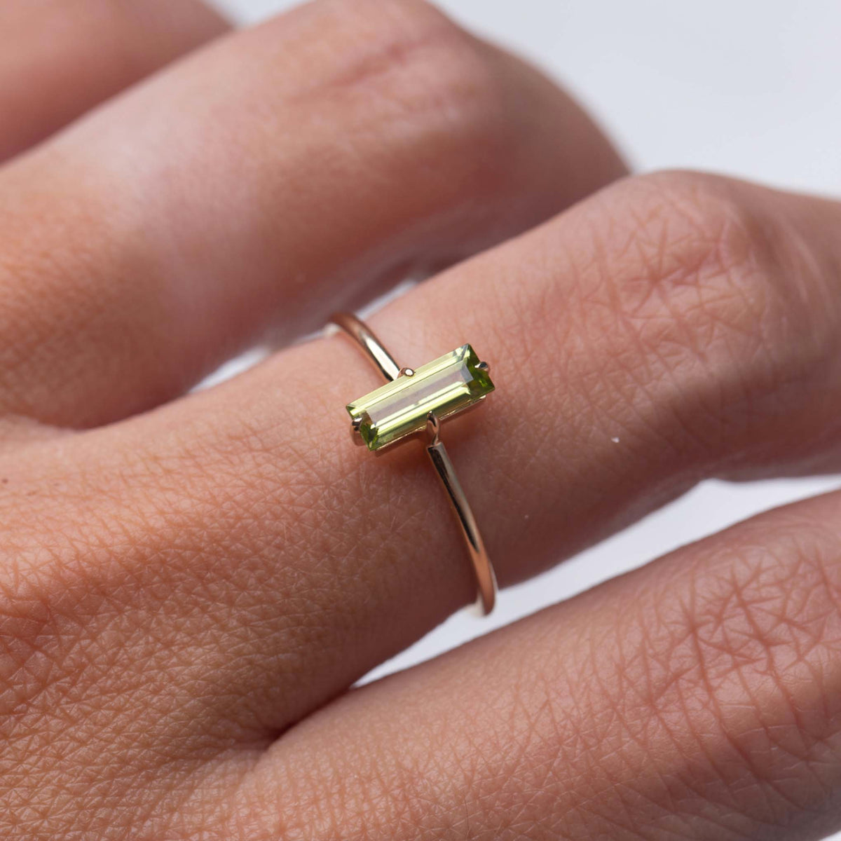 Solid Gold Peridot Baguette Ring