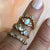 Rainbow Moonstone and Topaz Half Eternity Marquise Ring